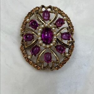 Elegant Gold and Purple Brooch